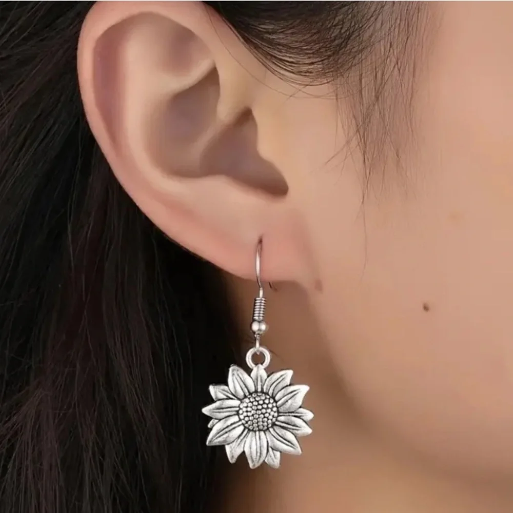 BOGO! Sunflower dangle Earrings Silver color Boutique